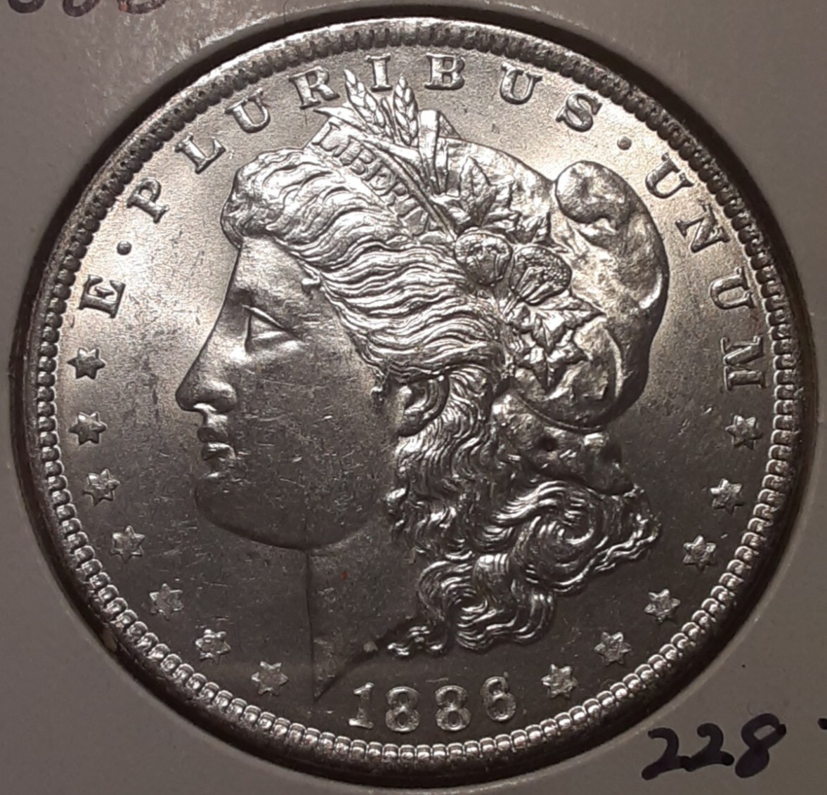 1886 $1 Morgan Silver Dollar Philadelphia Mint US 90% silver (228-2879/30)
