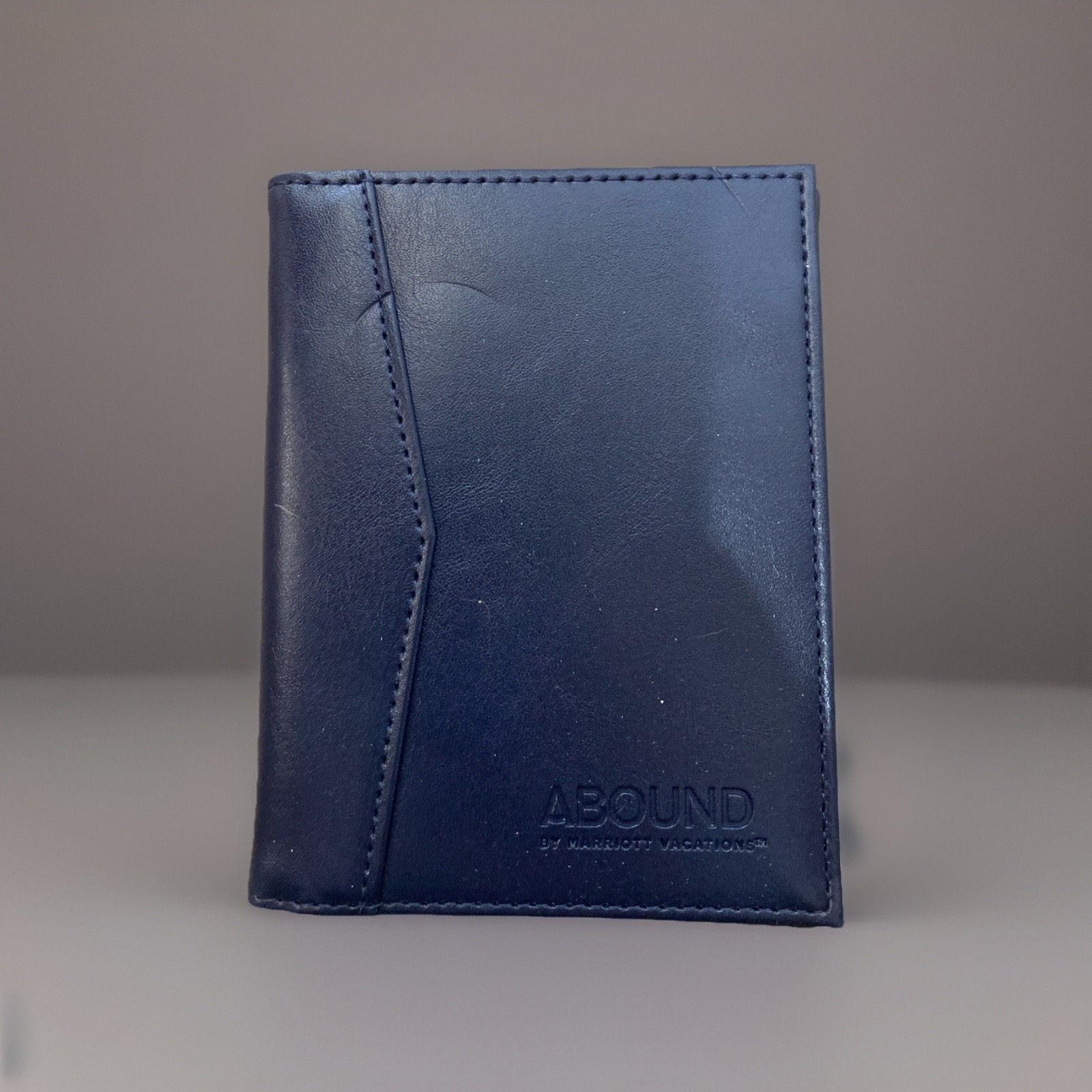 VTG Navy Blue Faux Leather Passport Holder Abound by Marriott Vacations Logo