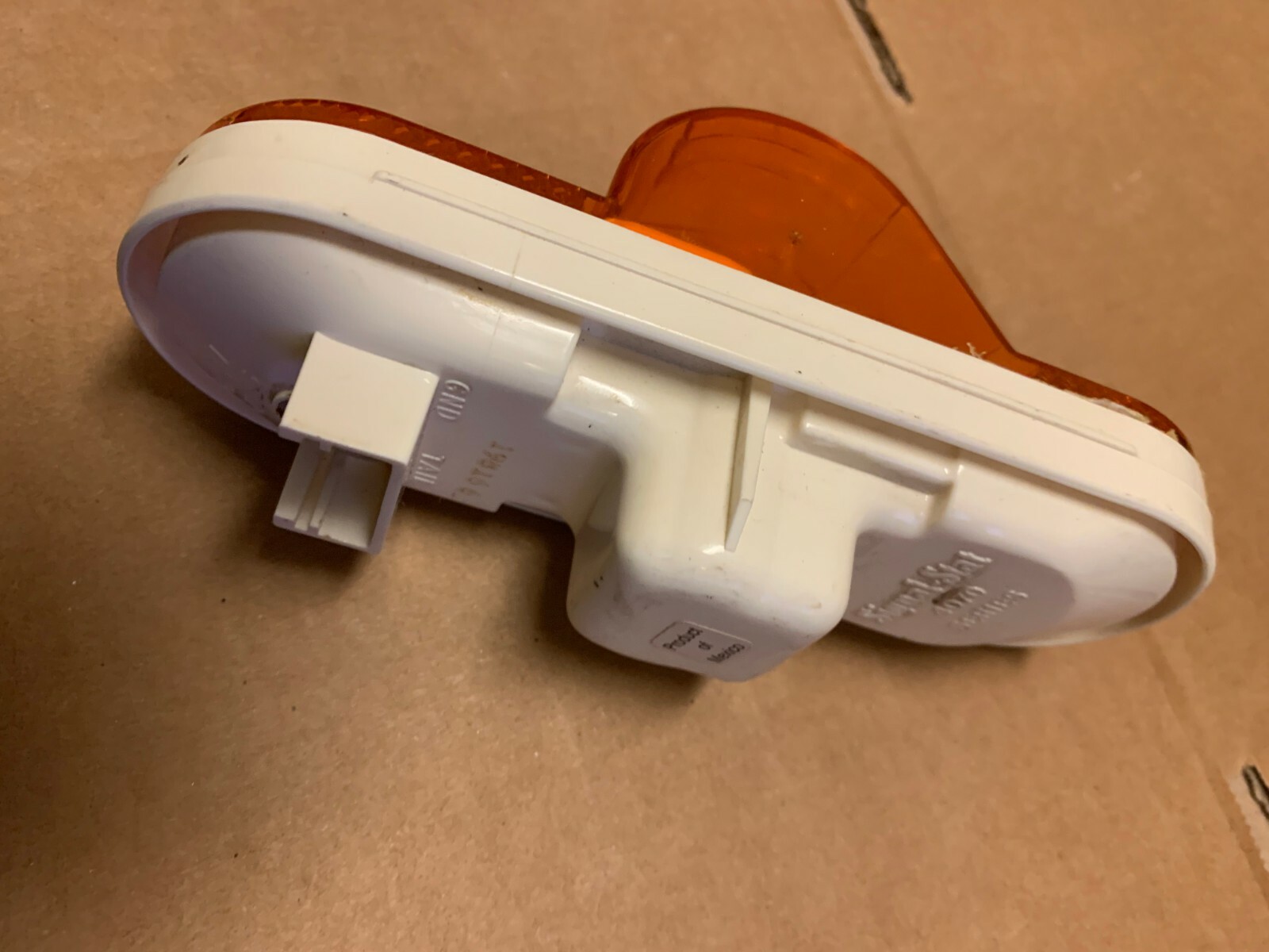 ONE GENUINE SIGNAL-STAT ORANGE STOP TURN TAIL LIGHT 4073
