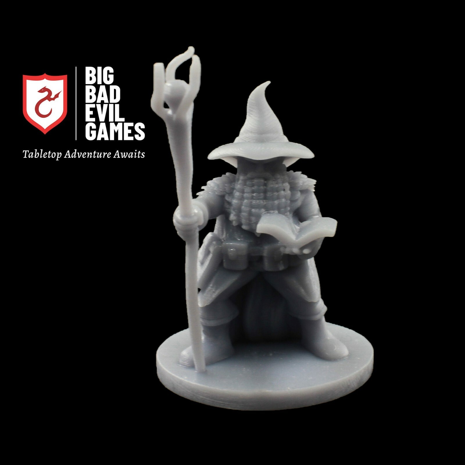 Dwarf Wizard Miniature | With his fancy braided beard, carrying his spell book