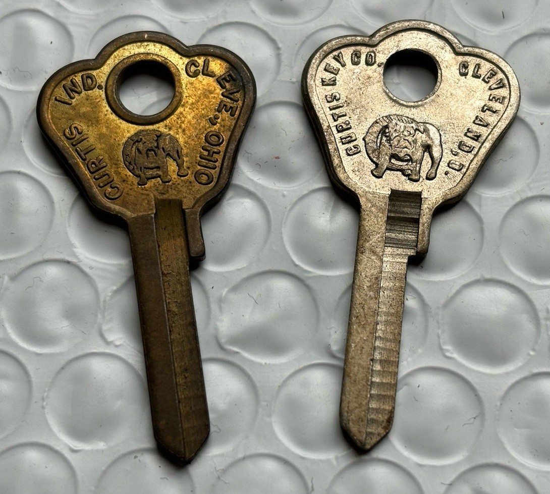 H8 key blank H-8  VINTAGE key Curtis Bulldog logo   1 Brass Tone & 1 Silver Tone