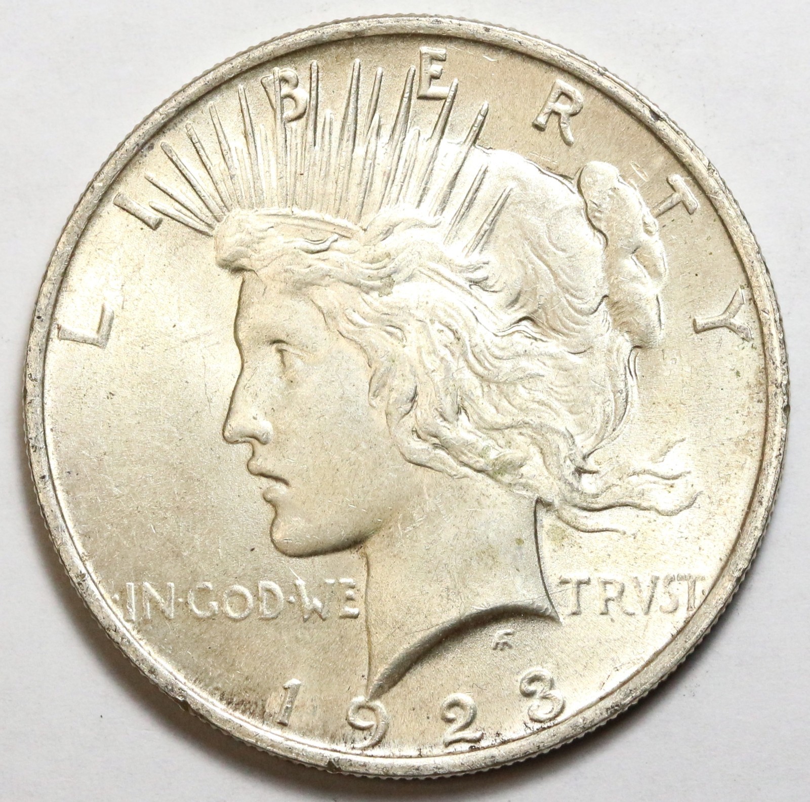 1923 $1 Peace Silver Dollar Uncirculated - RAW - Excellent Luster / Toned