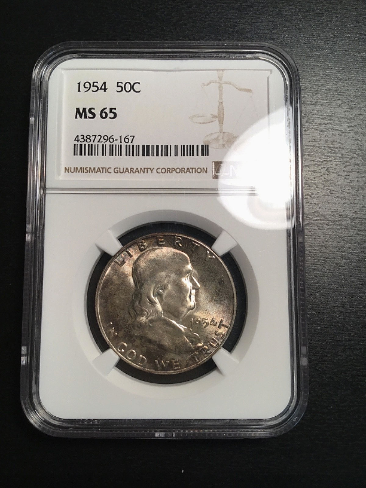 1954-P Franklin Silver Half Dollar 50C NGC MS 65 Original Crusty Toning.