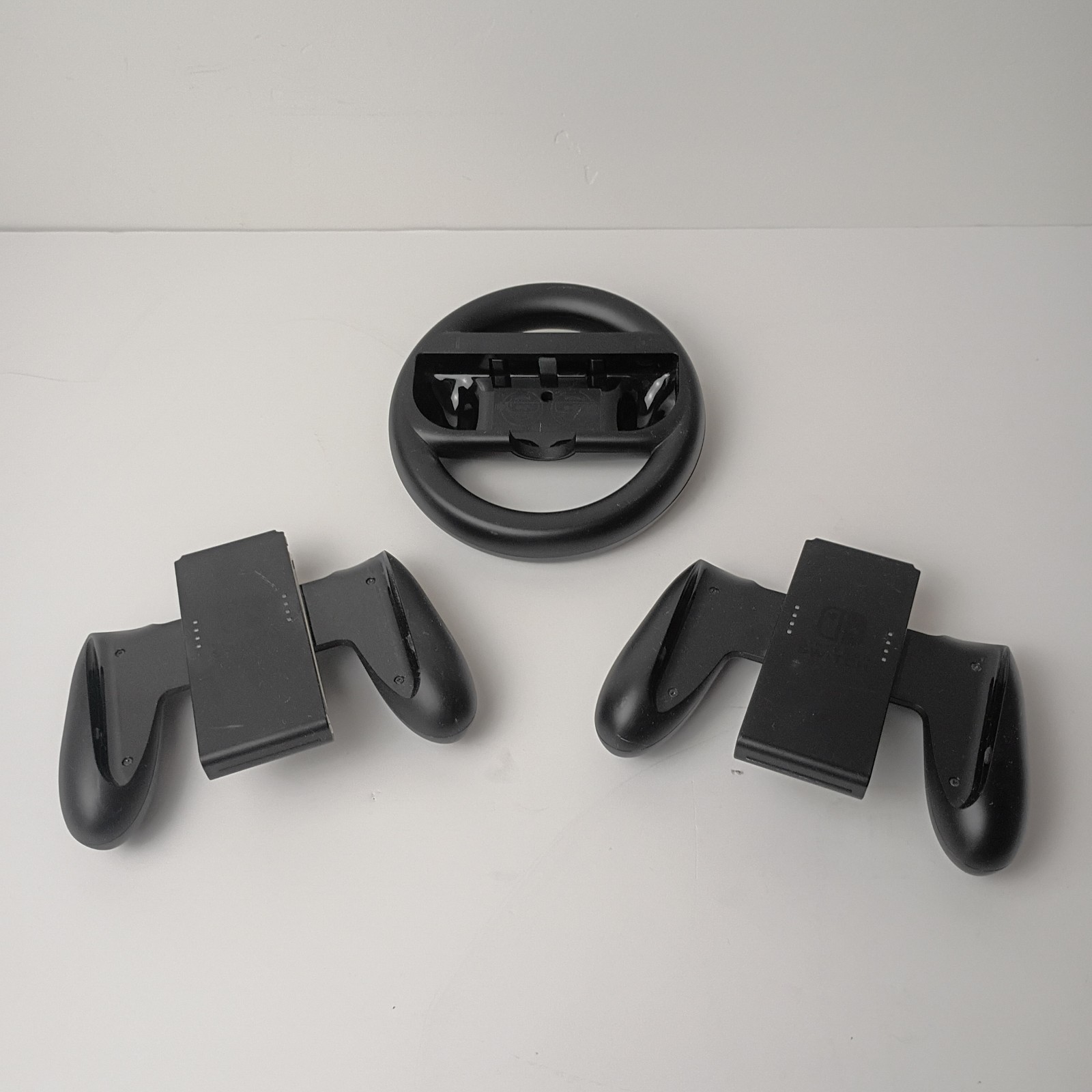 Nintendo Switch Game Accessories: 1 Steering Wheel and 2 Controller Grips