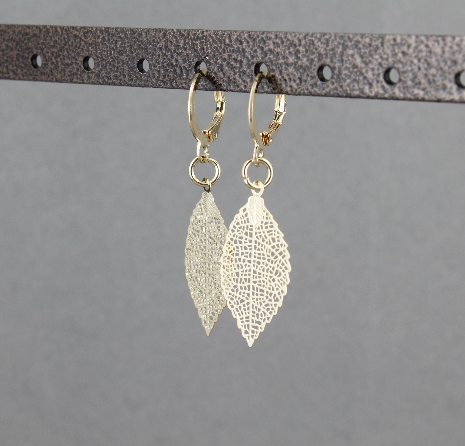gold leaf earrings small filigree leaves dangle 1.75" long leverback lightweight