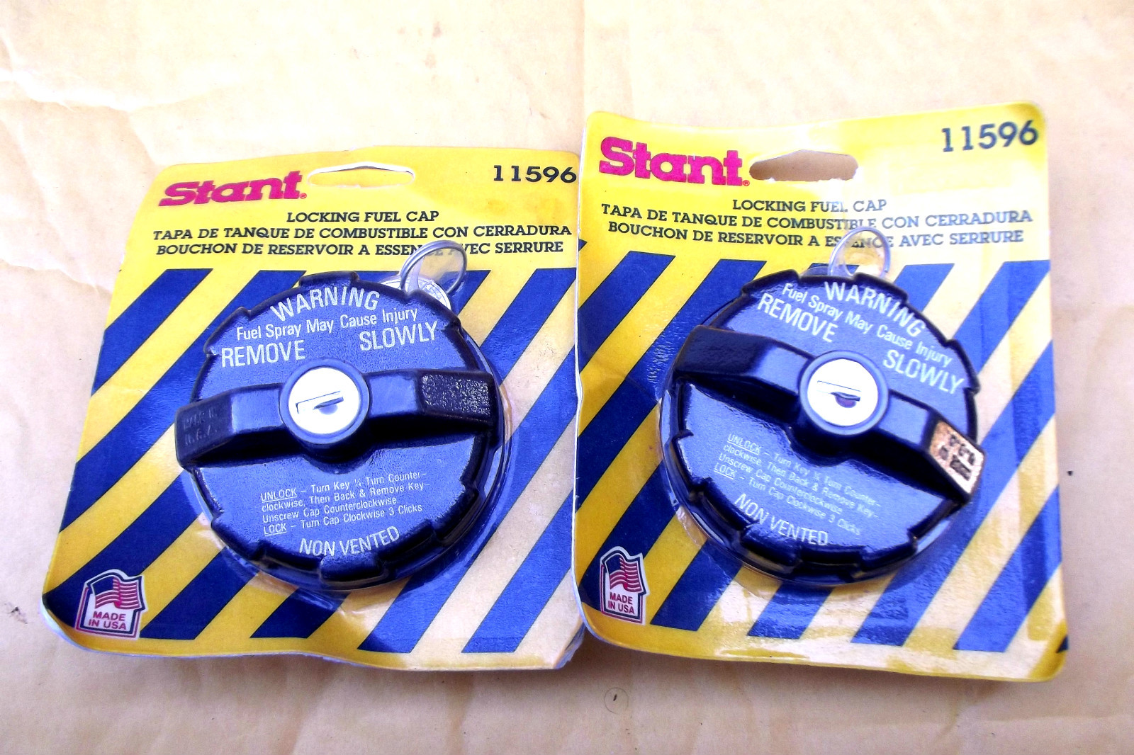 1 NEW STANT 11596, LOCKING GAS/FUEL CAP,CARDED,MADE IN USA.