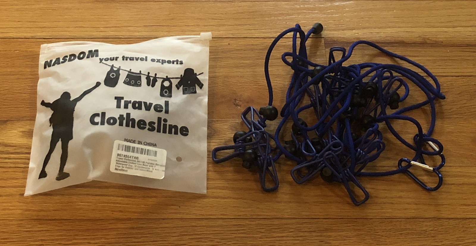 New Unused Travel Clothesline Adjustable Up To 13’  12 Clothes Pins With Case