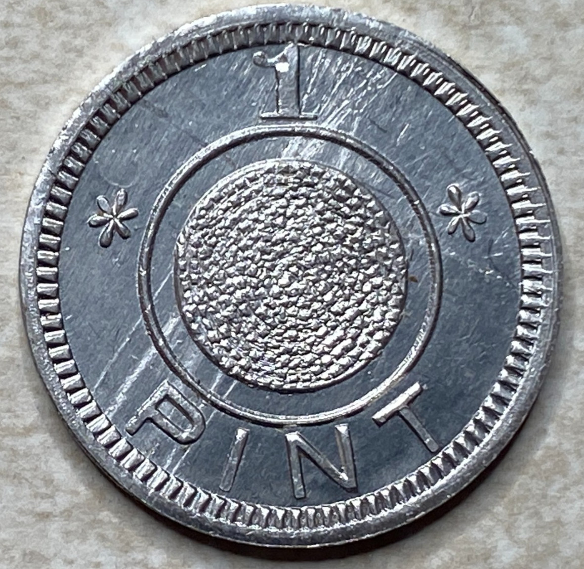 T9247 1 Pint, Unknown  Anillo Restrike Arcade Token