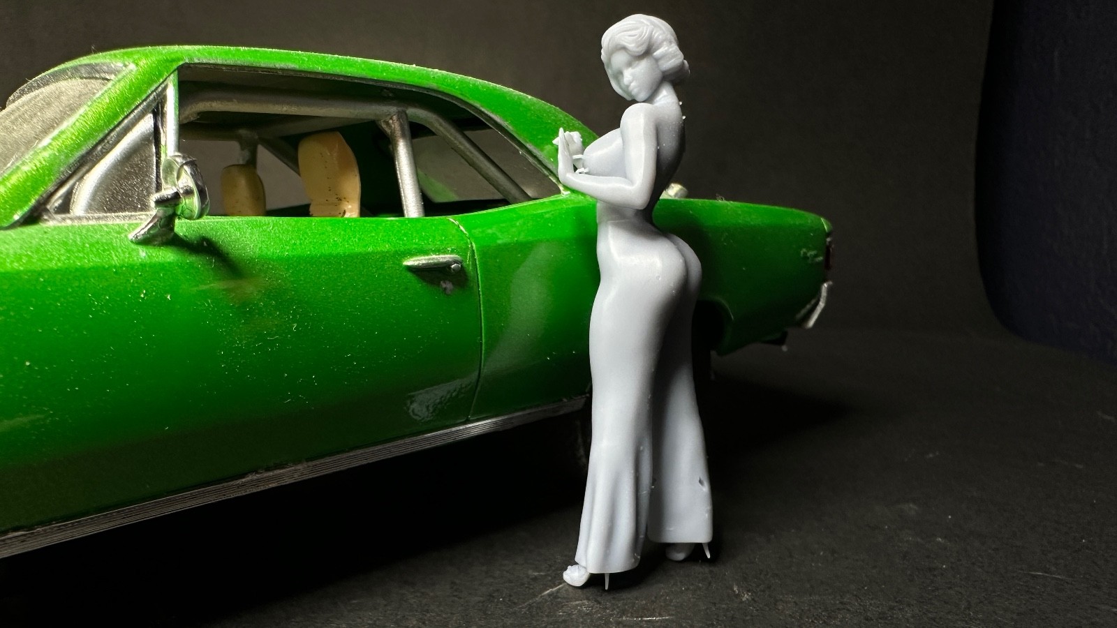 Jennifer pantsuit against car
