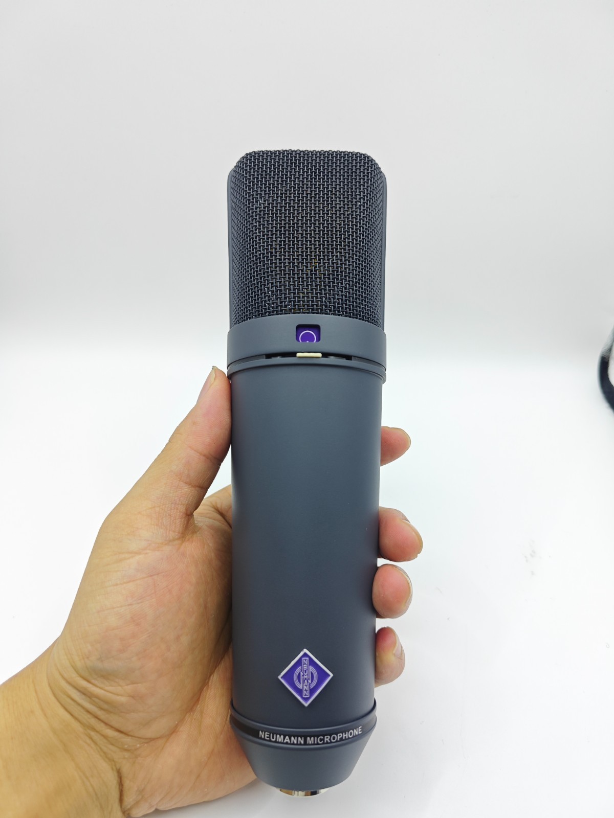 High-quality custom black U87AI condenser microphone, featuring three directiona