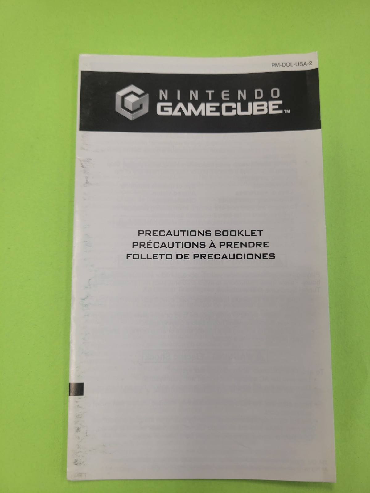 Gamecube Health & Safety Precautions Booklet pm- Dol-usa-2  (45749C)