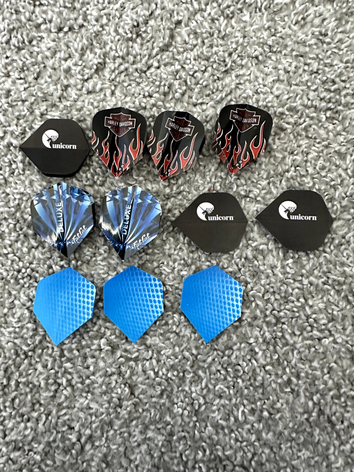Set of dart fins. 3-unicorn brand, 3-harley davidson, 2 deluxe fatcat, 3-blue