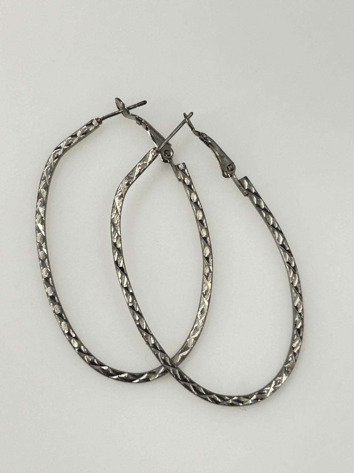 Silver Tone Textured Oval Hoop Earrings Lightweight