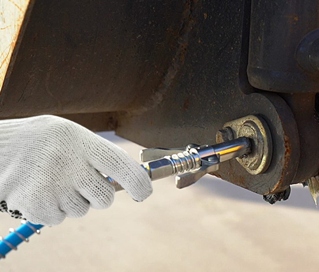 Locking grease gun coupler allows for easy release of from grease...