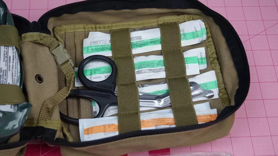 North American Rescue Combat Casualty Response Kit With Med Supplies See photos