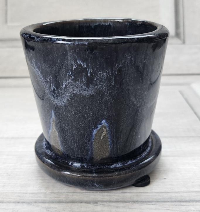 Small planter dark blue glaze brown gray lighter blue drain hole on side 201-4