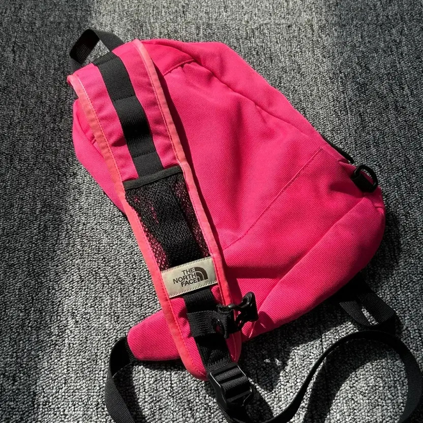 The North Face Pink Sling Bag