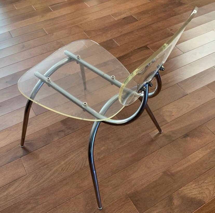 Contemporary acrylic and steel chair. Artsy!
