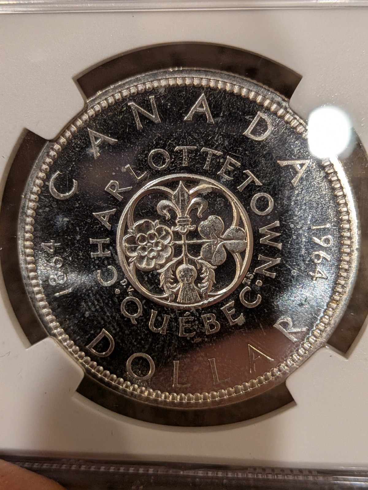 1964 CANADA SILVER $1 DOLLAR..NGC PL-65
