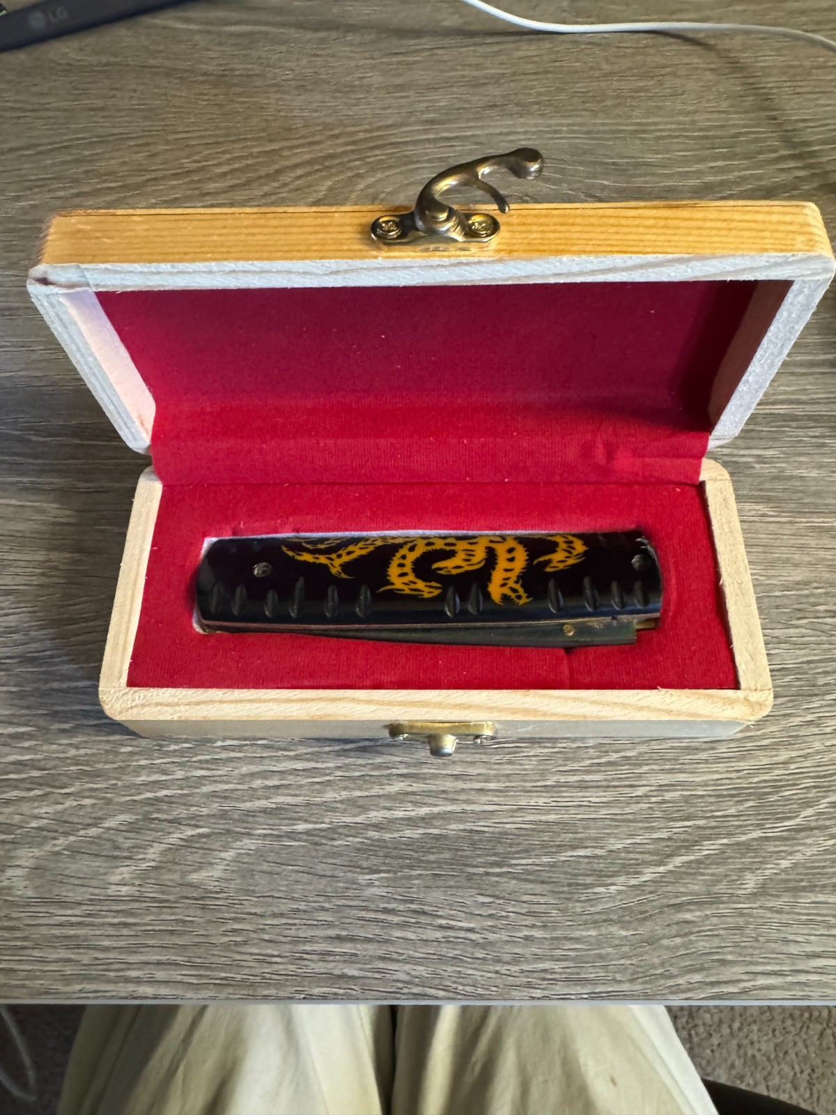 Japanese hand crafted pocket knife with a traditional dragon design and box