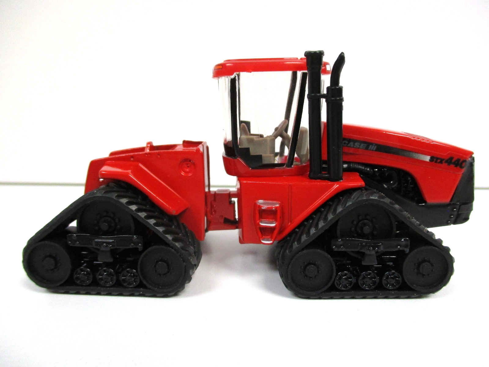 ERTL - CASE IH QUADTRAC STX440 4WD TRACTOR - 1/64 DIECAST