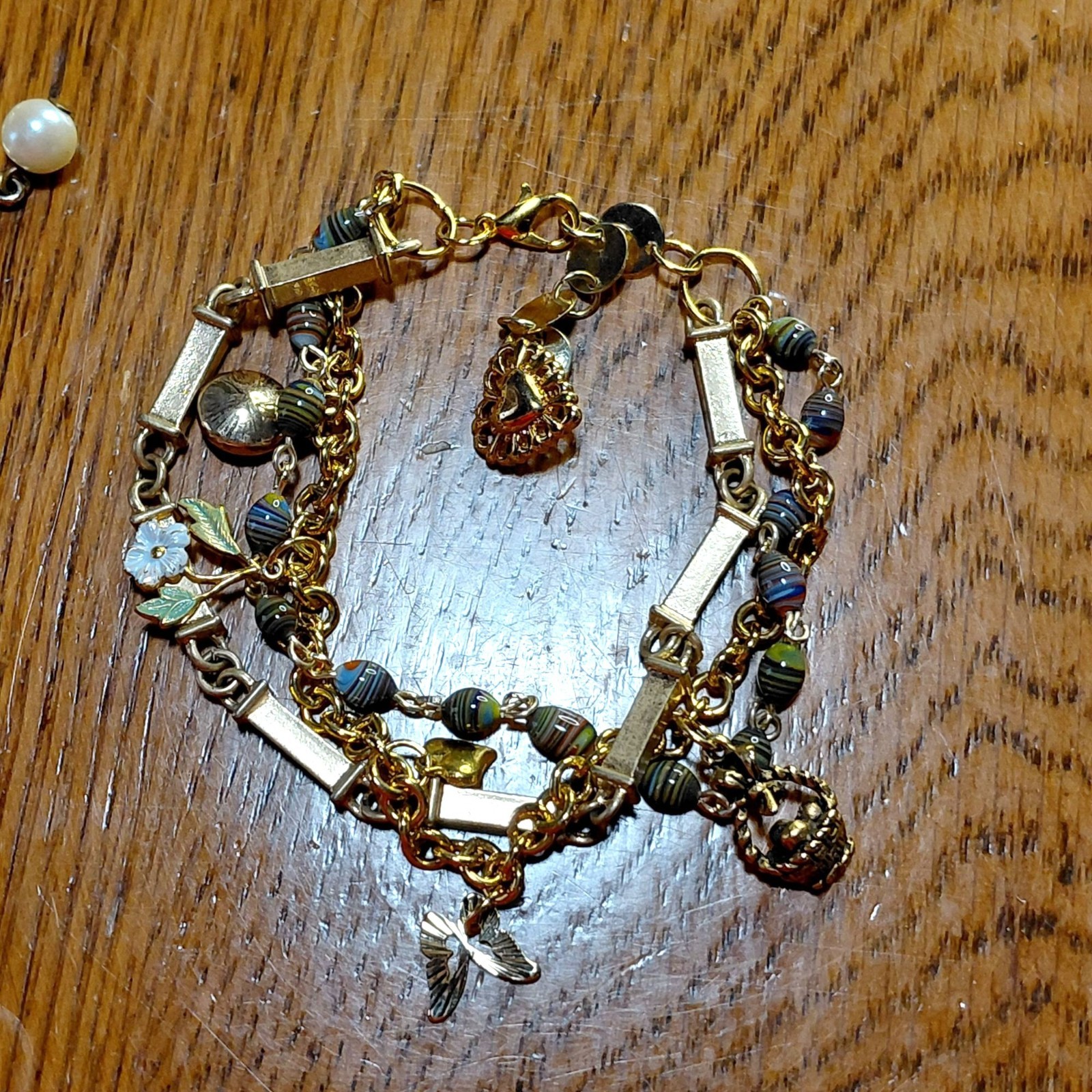 Handmade gold tone charm bracelet hearts flowers butterfly