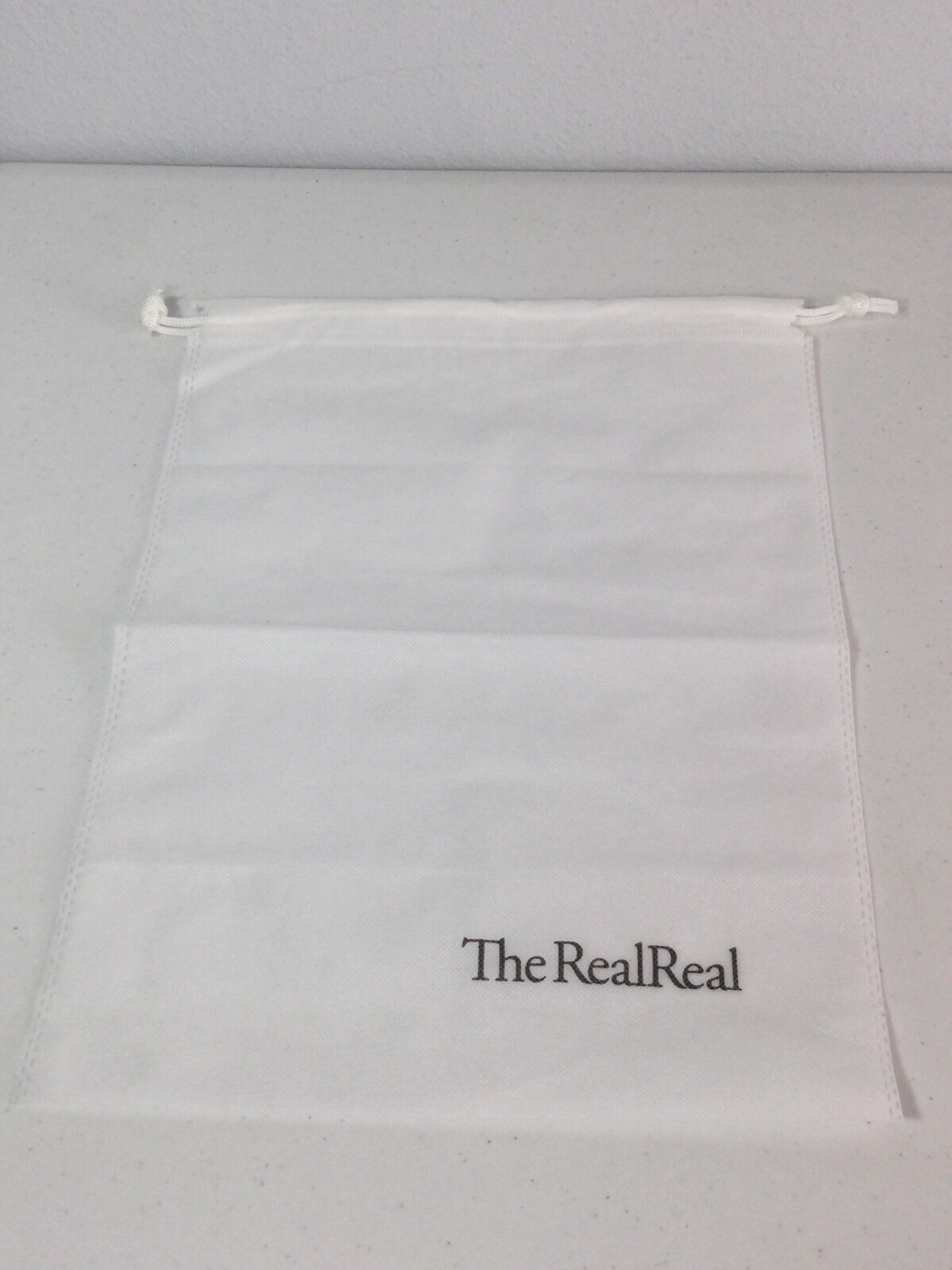 THE REAL REAL White Mesh Drawstring Dust Cover. 15.5”x11.75”. NEW.
