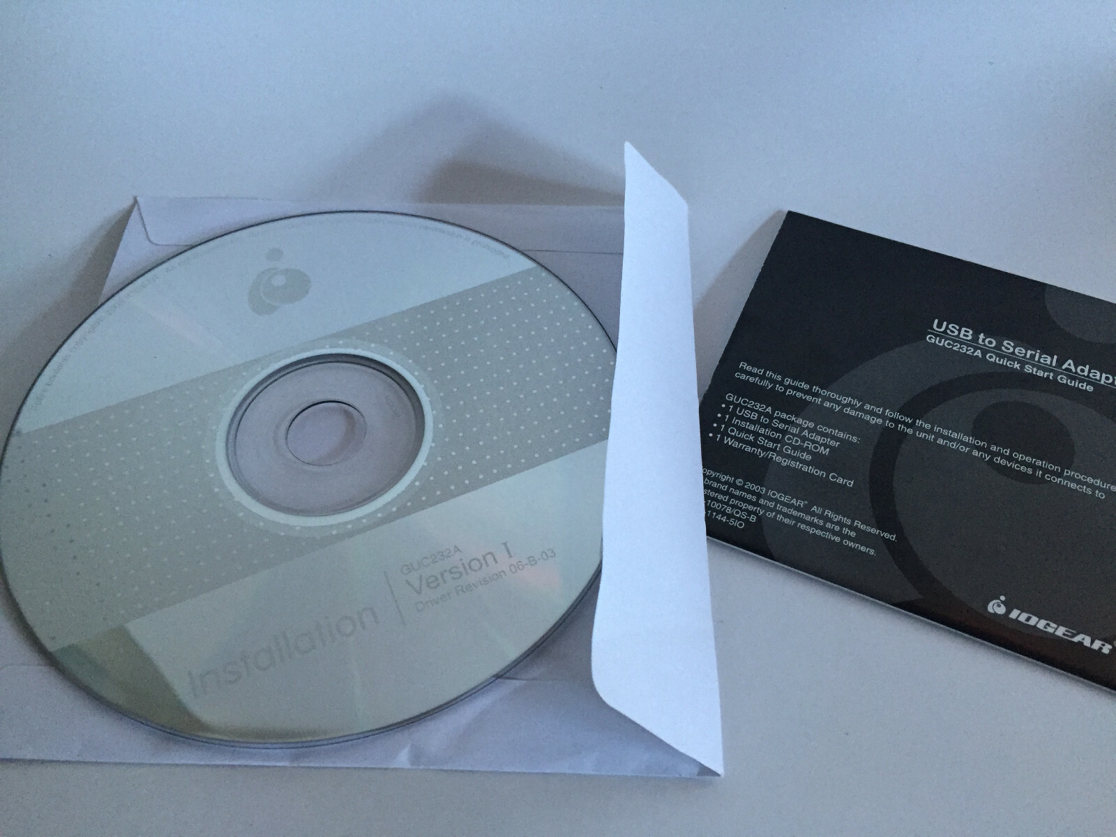 IOGEAR USB to Serial adapter installation CD with GUC232A quick start guide