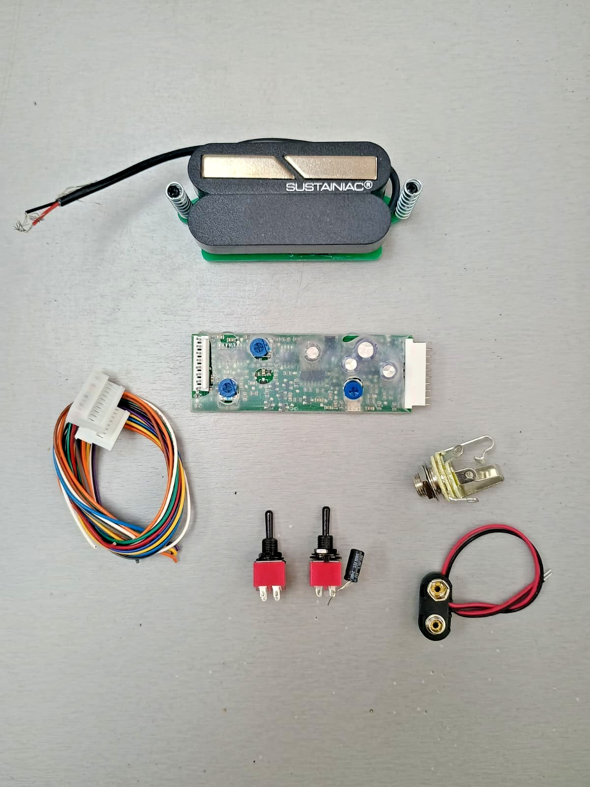 SUSTAINIAC STEALTH PRO KIT WITH BLACK LOOSE TOGGLE SWITCHES AND HUMBUCKER DRIVER