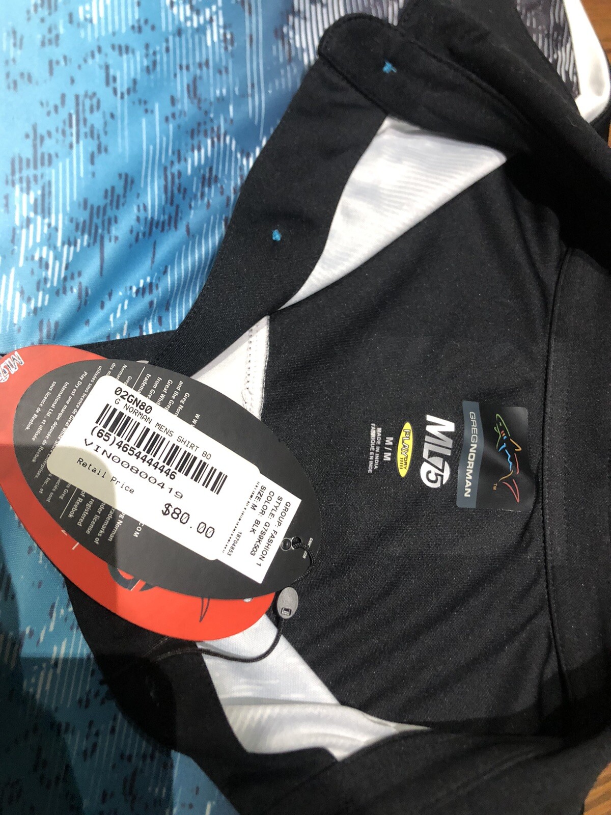Greg Norman - Golf Shirt- Medium (new with tags)