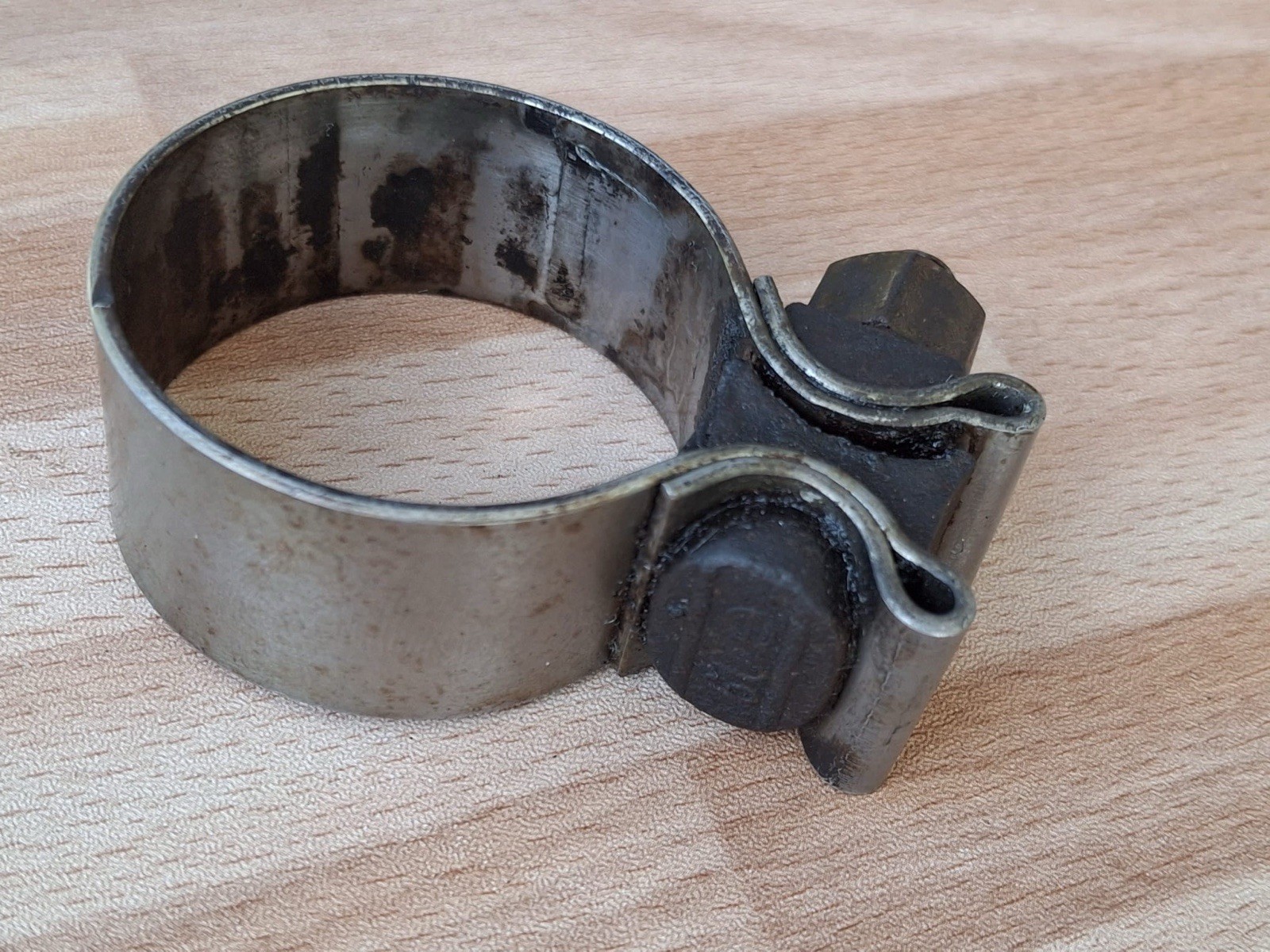 99-06 BMW R1150 R. Used OEM exhaust manifold clamp (p/n 18117653274).$14.00