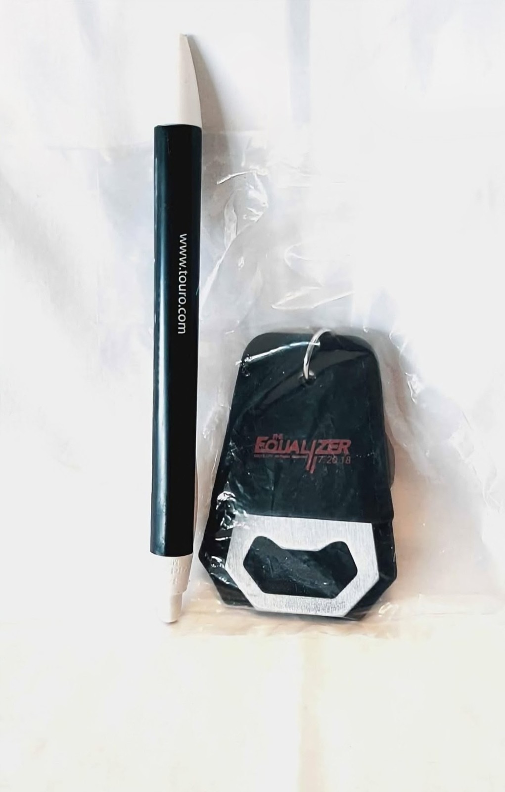 The Equalizer 7/20/18 bottle opener keychain.
