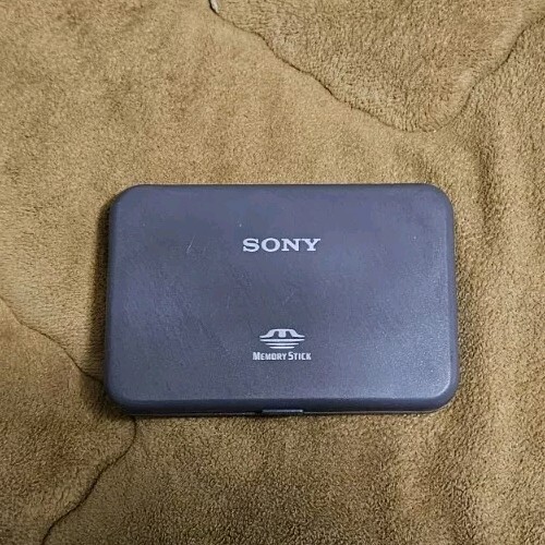 Eleven Sony Long Memory Sticks With Carrying Case Use With Old Camera