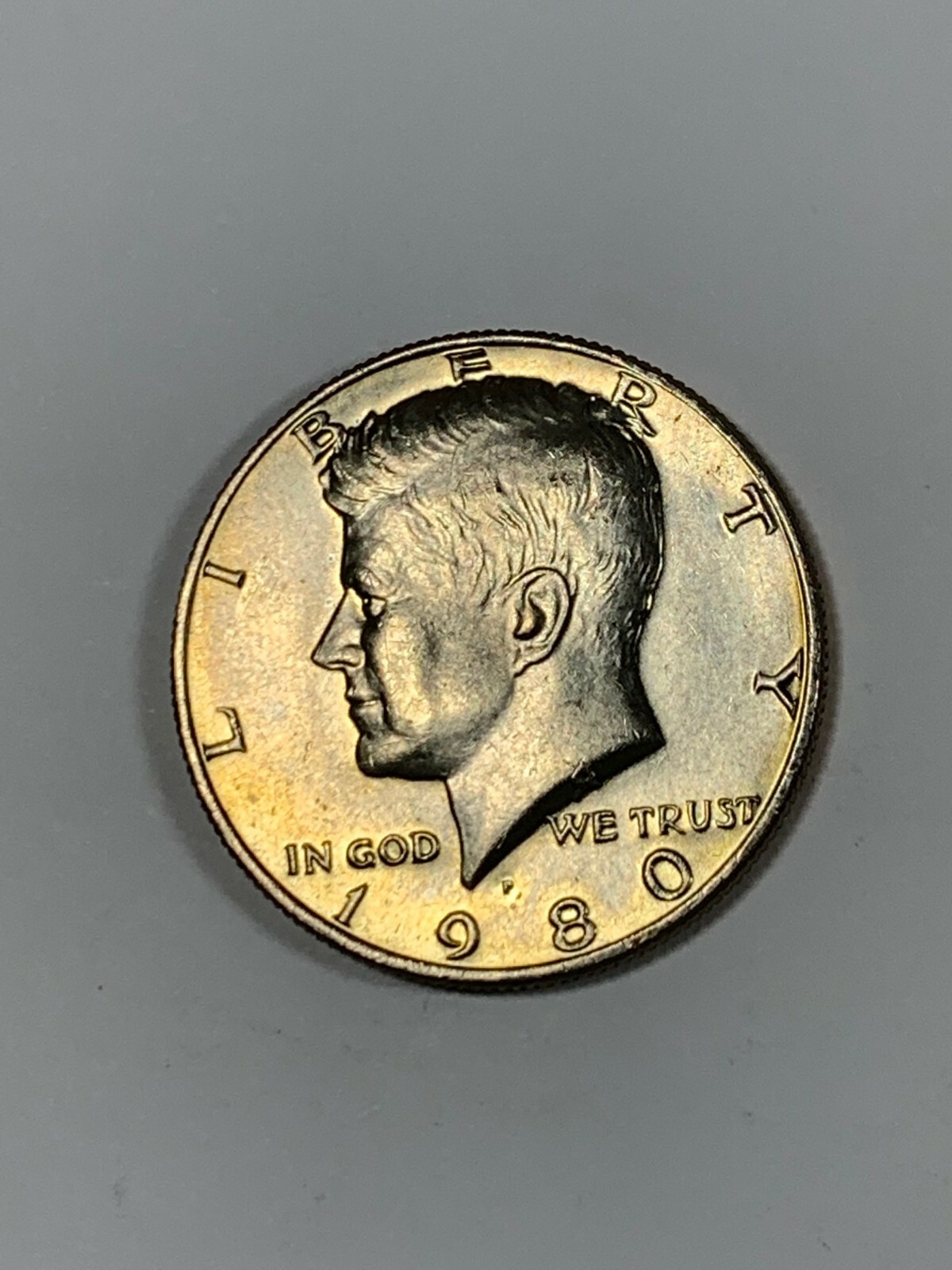 1980-P Clad Kennedy Almost Uncirculated to Uncirculated Half Dollar