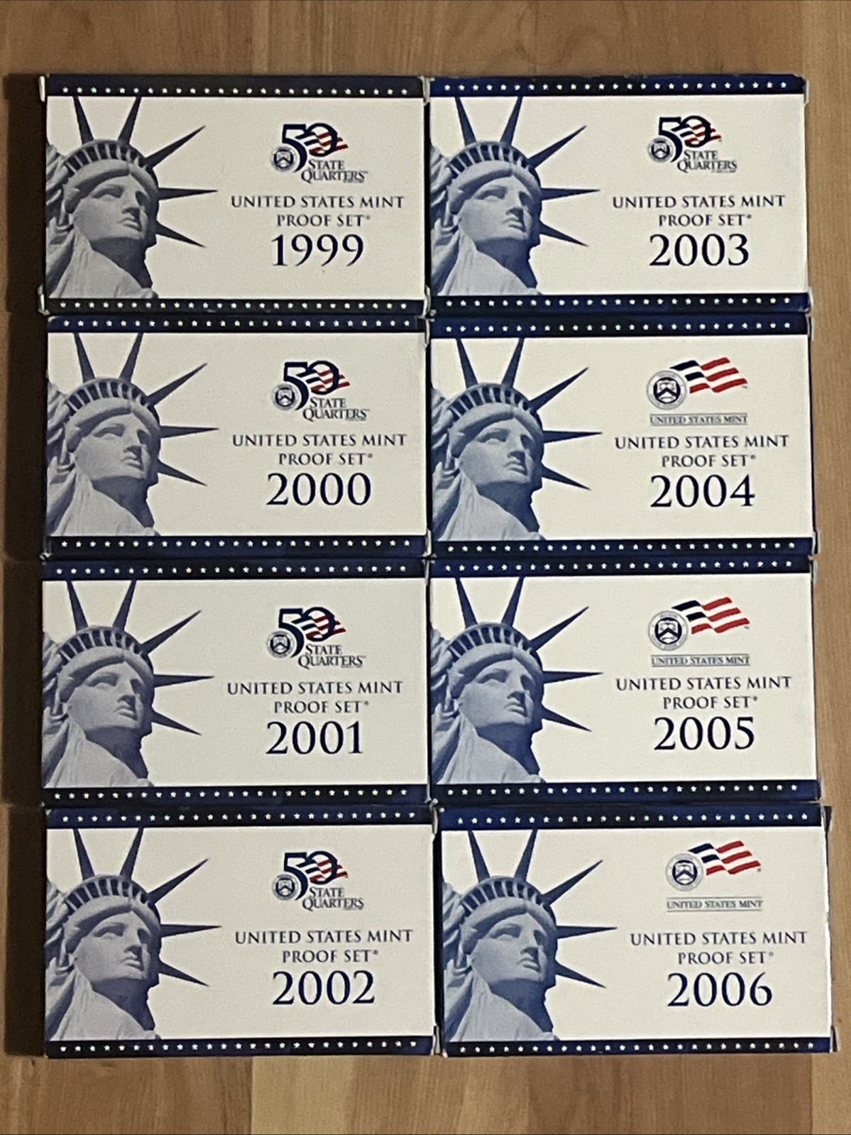 Lot of 8 US Mint Proof Sets, 1999-2006, All with OGP Boxes + COAs