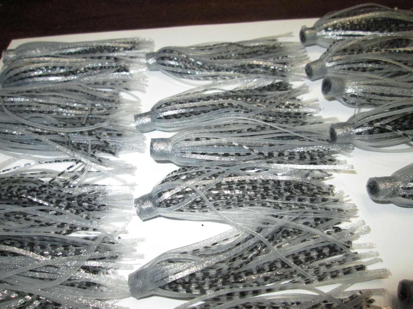 25 - QUICK CHANGE SILICONE RUBBER SKIRTS - 3" LONG - SILVER AND BLACK,,