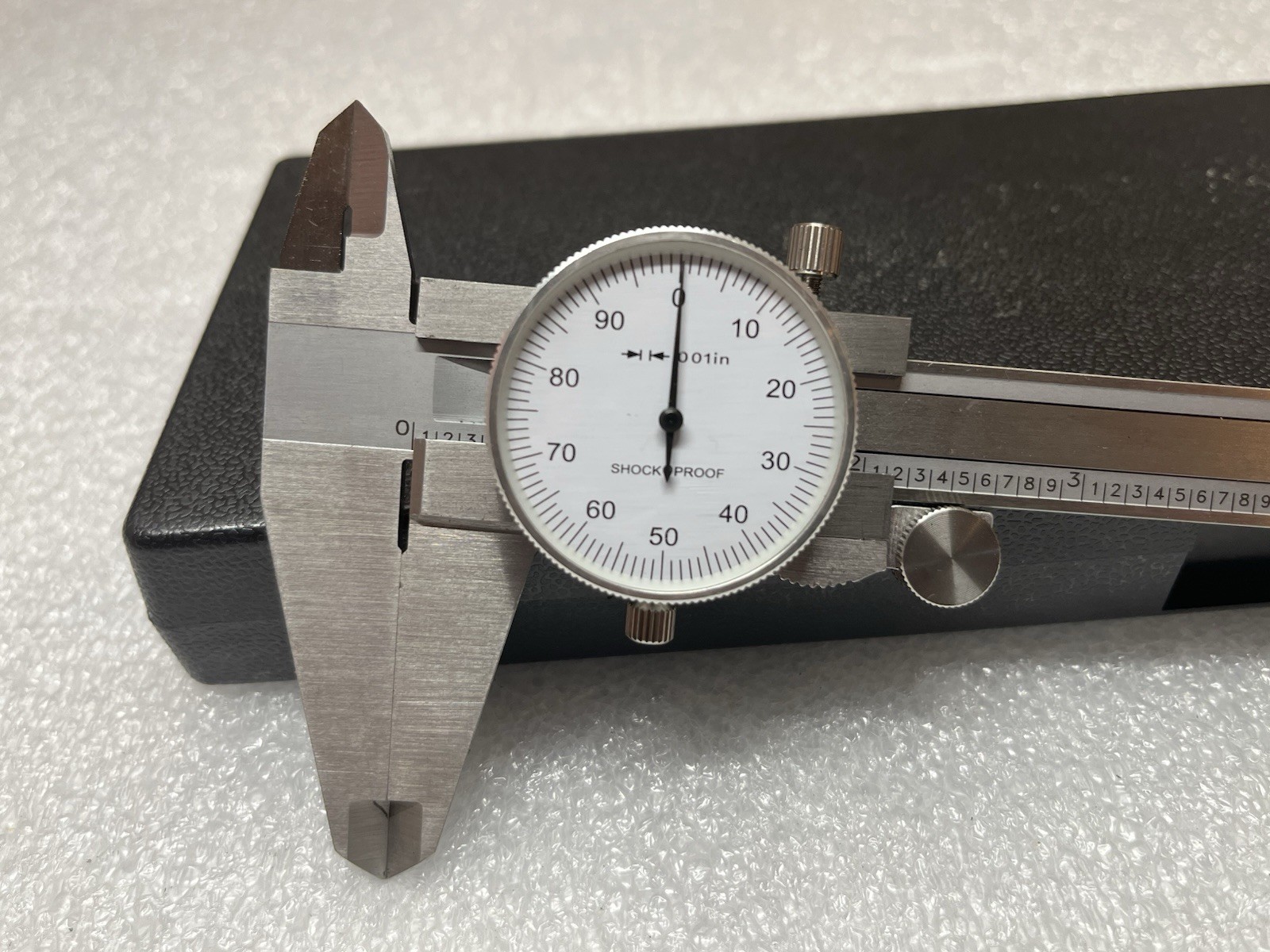 VALUE COLLECTION Dial Caliper: 8'' Range, 0.001'' Graduation, 0.1'' per Rev