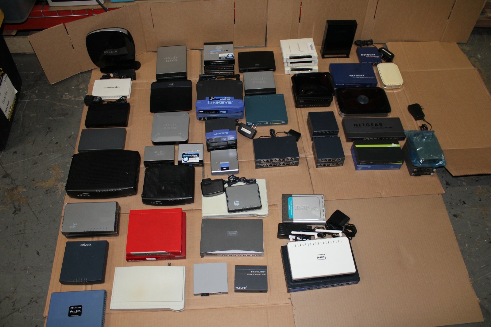 Mixed Lot of 61 Networking Devices i.e. TrendNet, Watchguard, Linksys, etc.