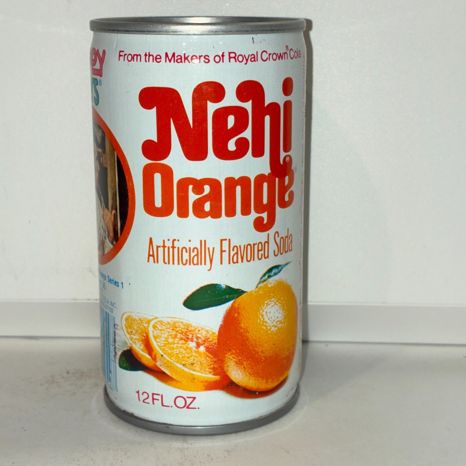 1970's Nehi Happy Days Orange Soda can, #11, bottom opened