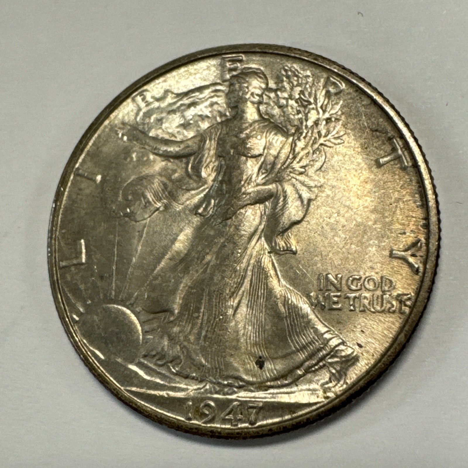 1947-D Walking Liberty Half Dollar Uncirculated-Toned