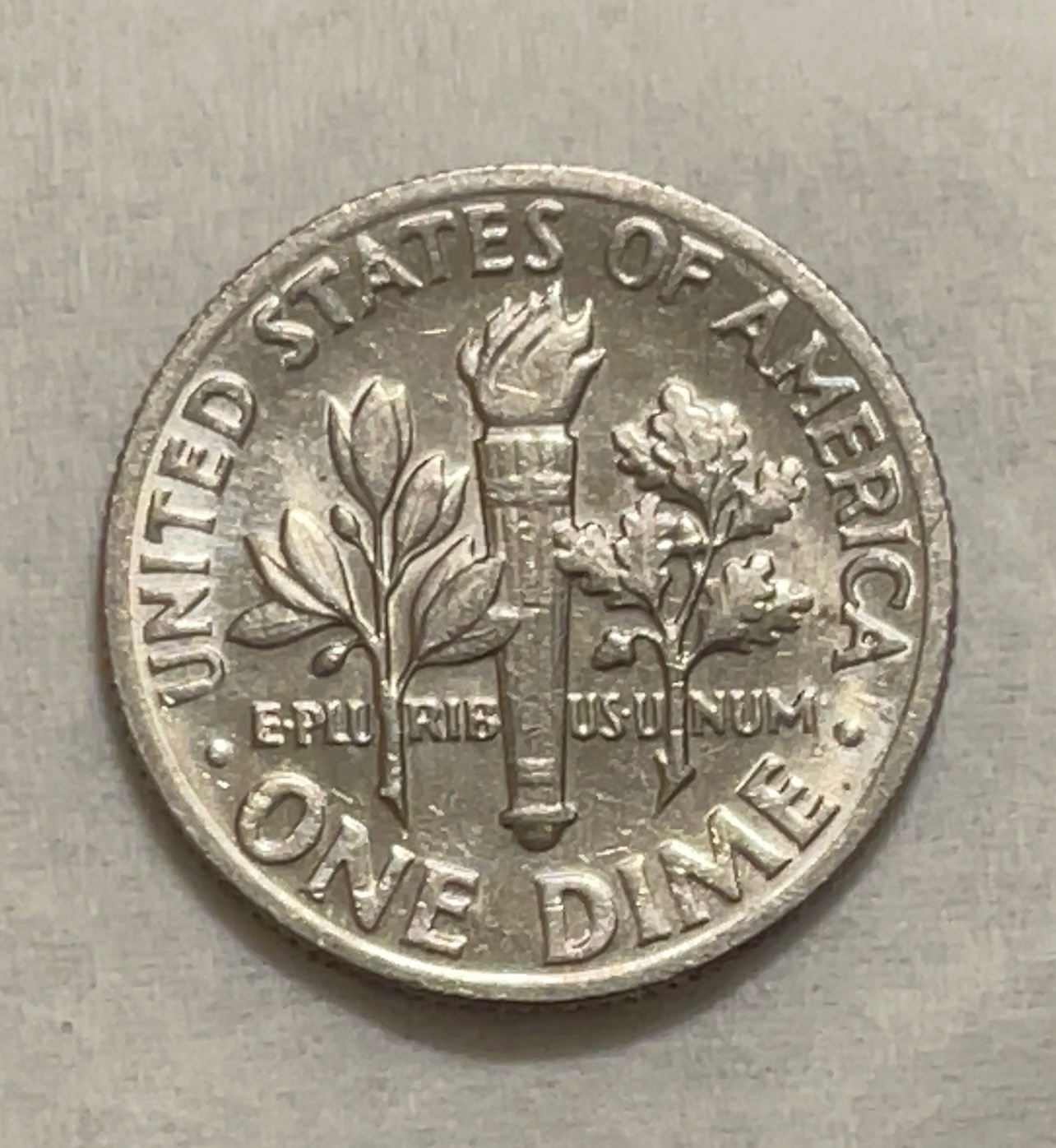 1973 no mint mark dime with DDO error