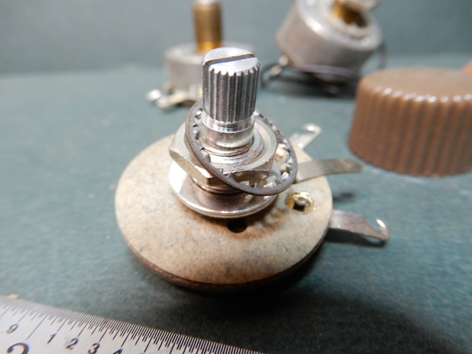 Two Used L-Pad 146 With Unique Daka-Ware Tan Knob Shown