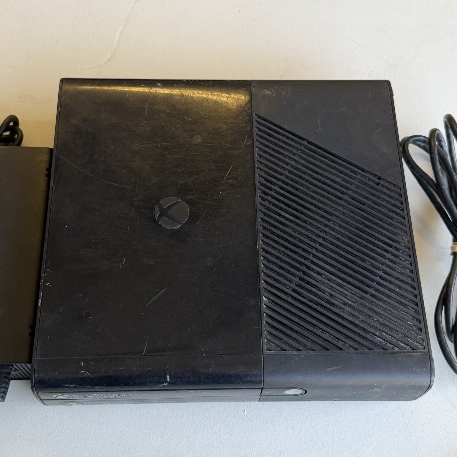 Microsoft Xbox 360 E Console 320GB W/ Controller, Cords + Grand Theft Auto V
