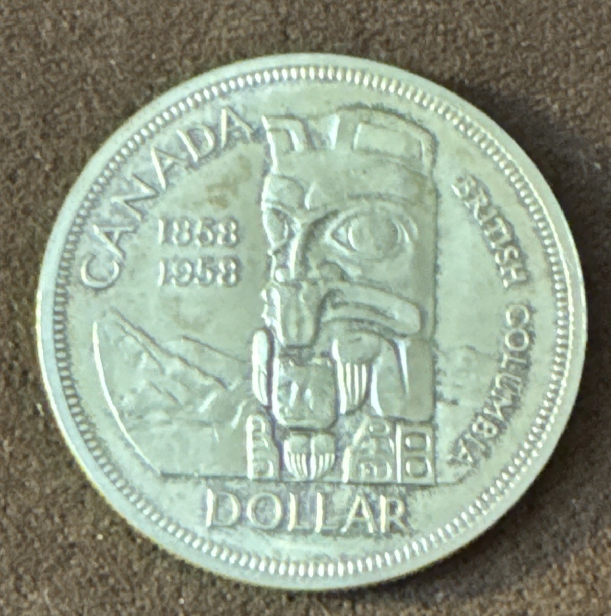 1958 Canada Silver Dollar British Columbia Totem Centennial W/ Toning