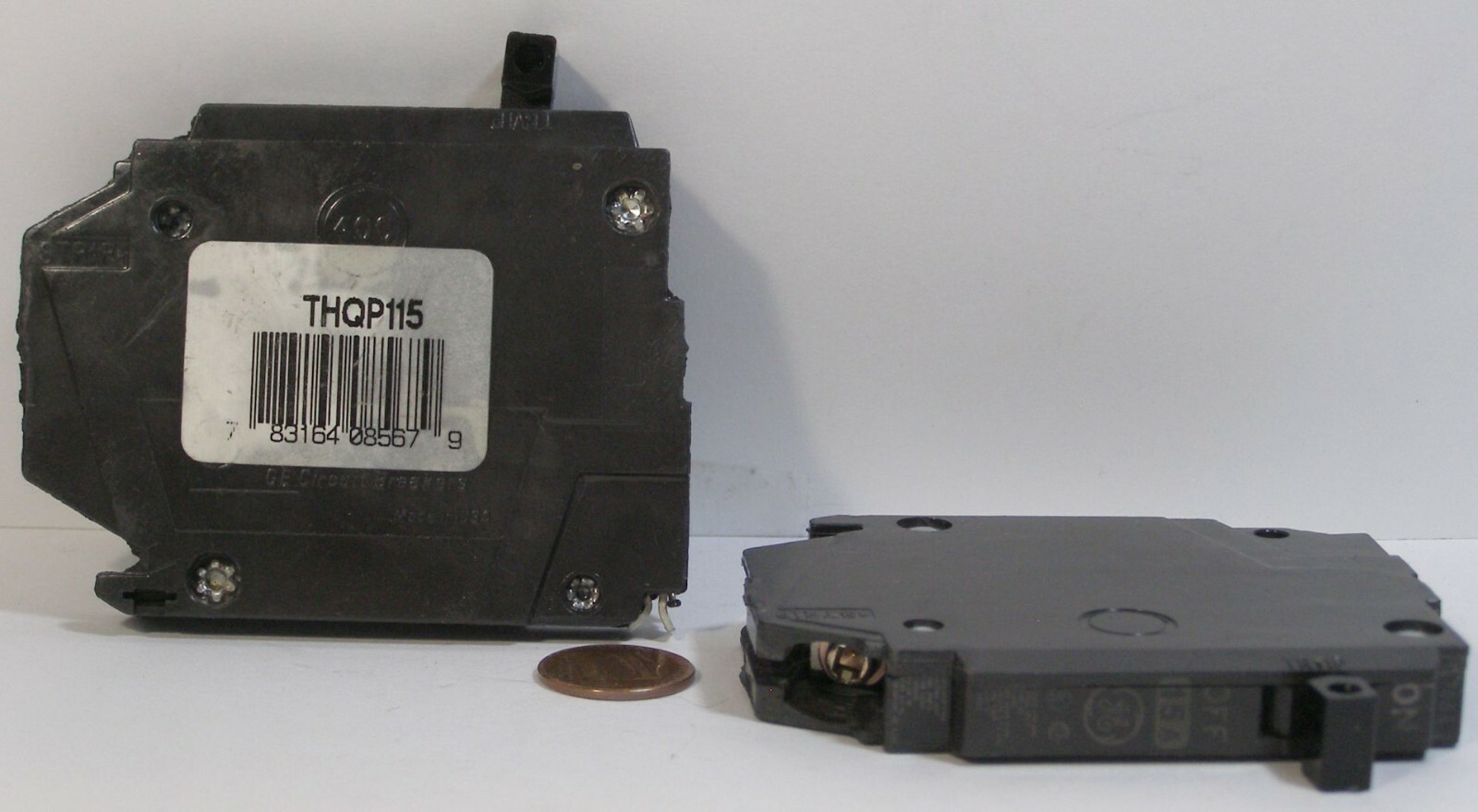 TWO GENERAL ELECTRIC TYPE THQP115 CIRCUIT BREAKERS   USED