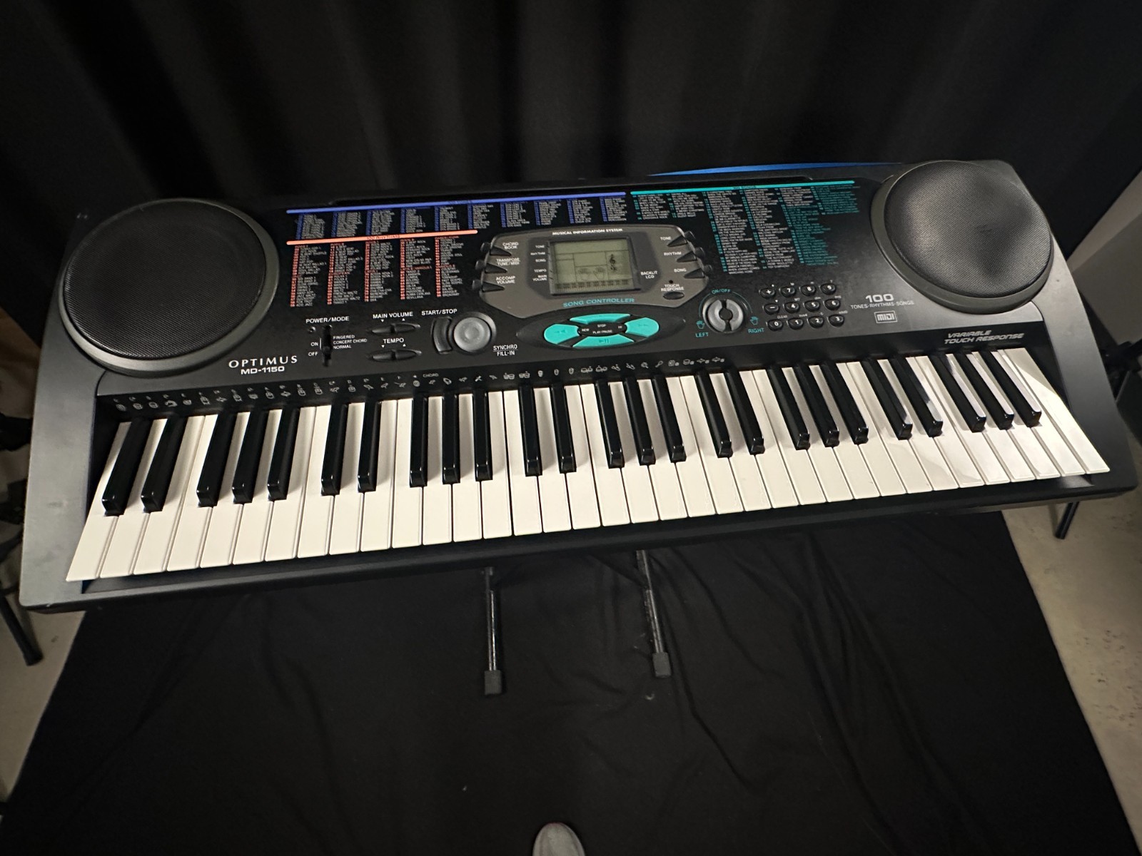 Optimus MD-1150 61-Key Electronic Keyboard, 100 songs, tones, rhythms, w/cord