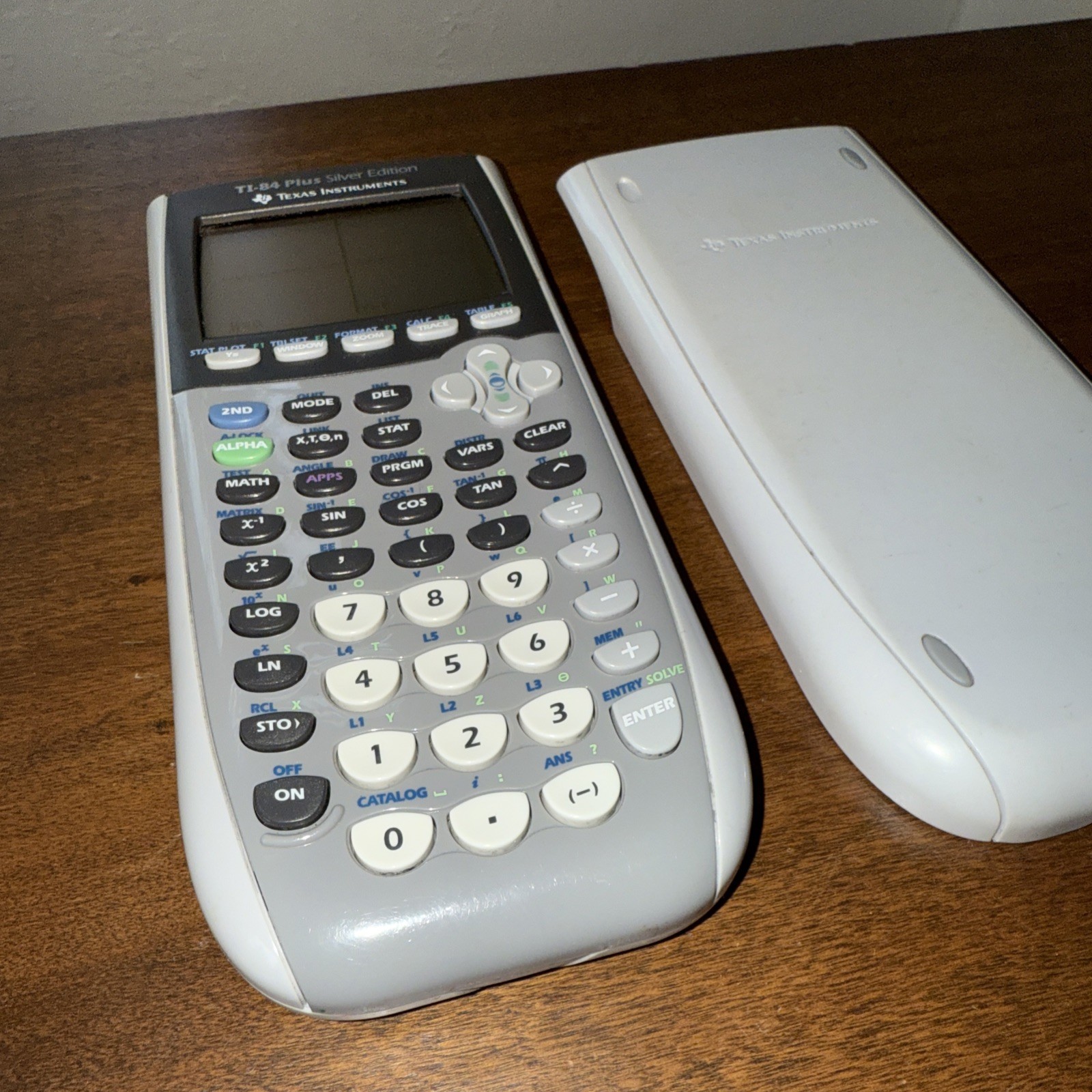 Texas Instruments TI-84 Plus Silver Edition Graphing Calculator with Cover