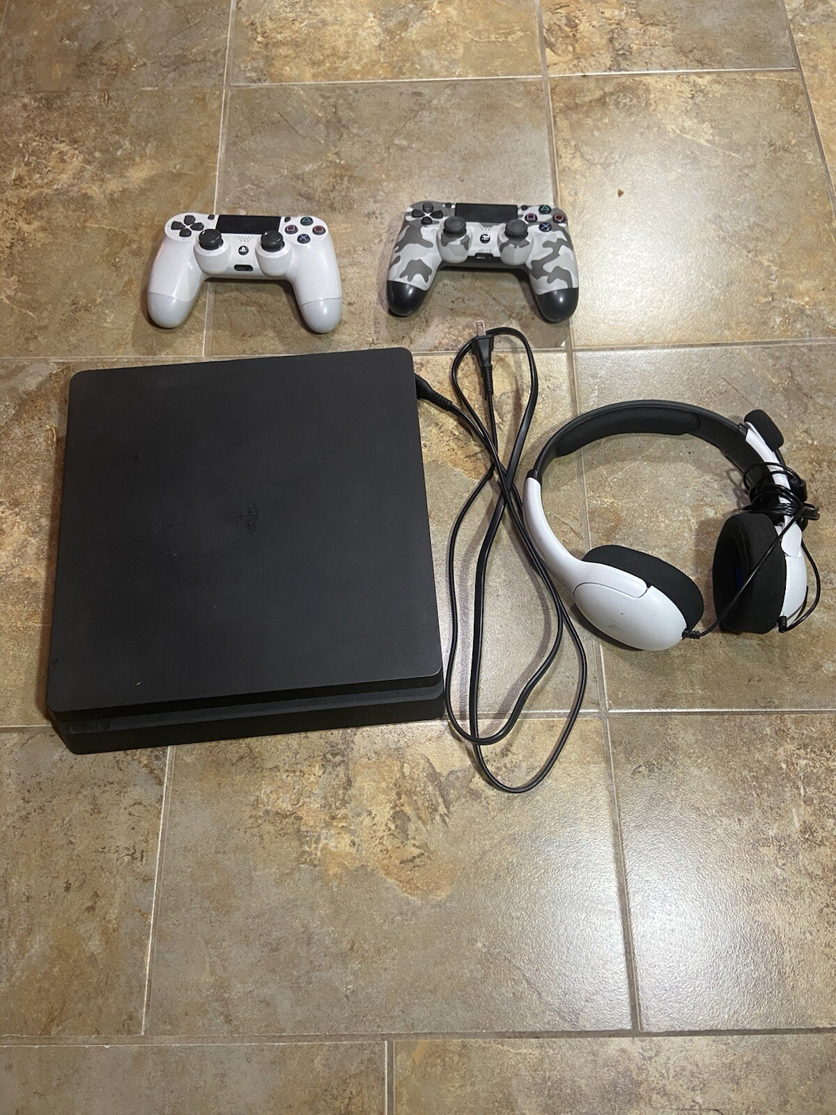 PS4 PERFECT CONDITION With 2 Controllers, A Cable, And Working Headset
