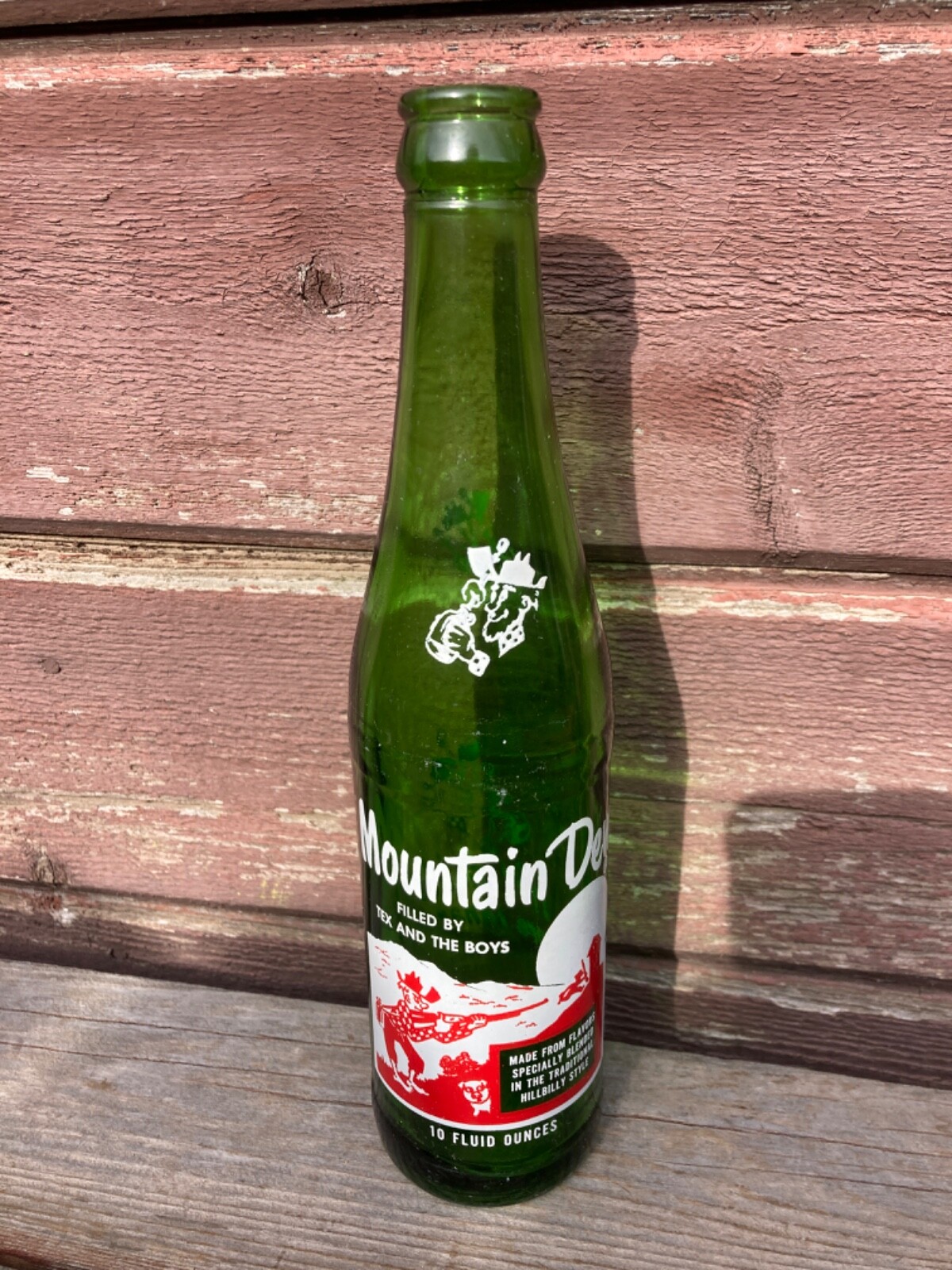 RARE VTG 1964 MOUNTAIN MT DEW SODE BOTTLE FILLED BY TEX AND THE BOYS TICKLE