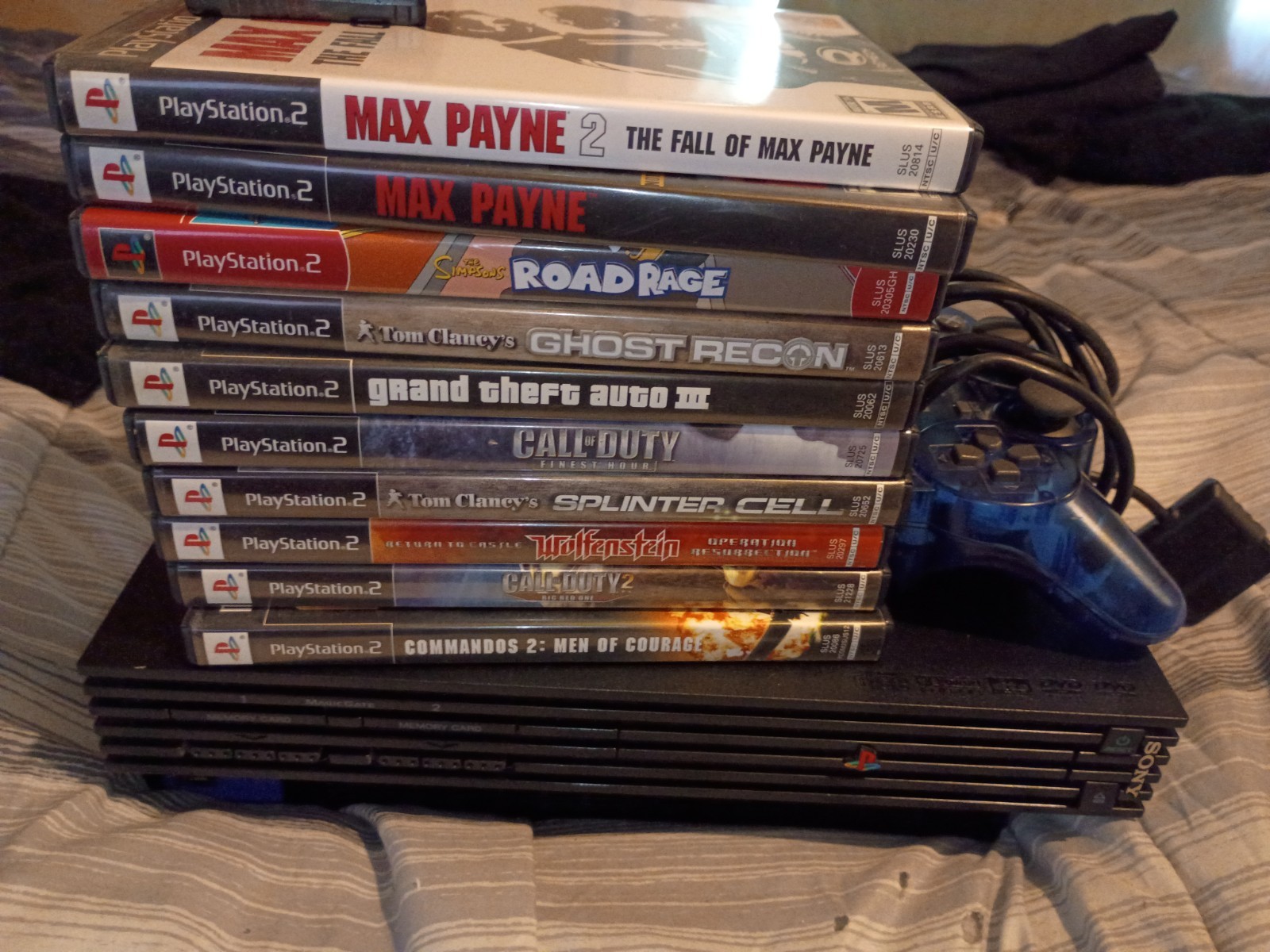 Sony PlayStation 2 Black Phat Model. Comes with Everything Needed to Play.